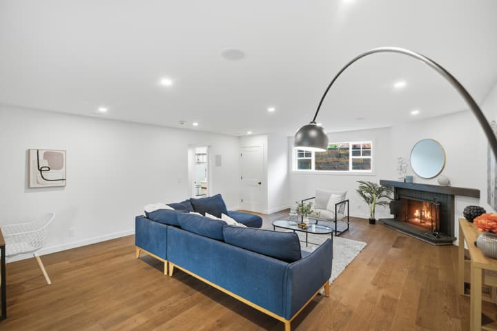 Living room with stone fireplace