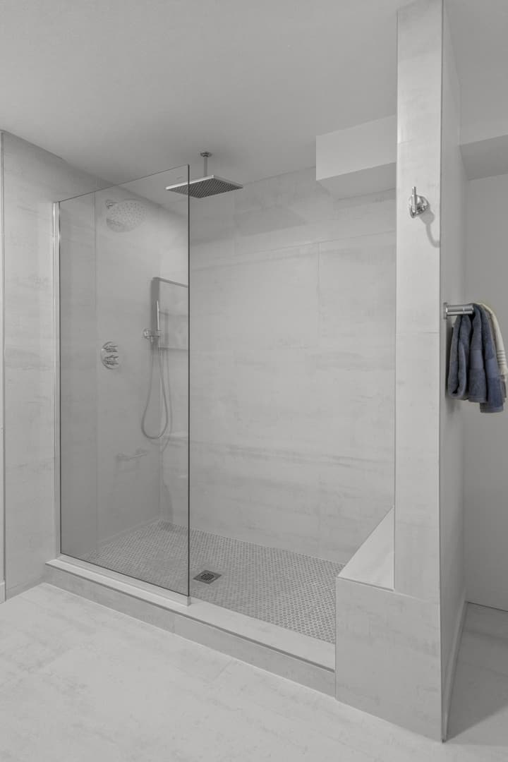 Large-format tile shower with niche