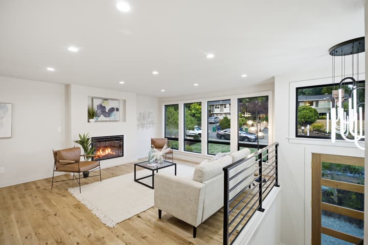 Open living room with linear fireplace