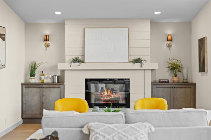 Living room fireplace with built-in shelving
