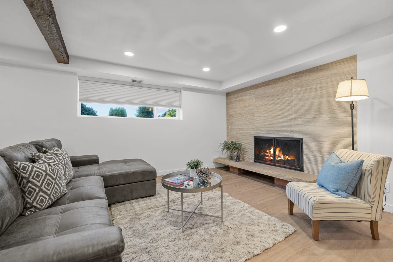 Finished basement lounge with fireplace, Burien